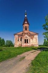 Fototapeta premium The old Orthodox church, built by Peter the first in honor of the birth of his son. Church in the Russian outback on the border with Finland.