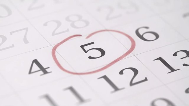 Marking the fifth 5 day of a month in the calendar with a red marker