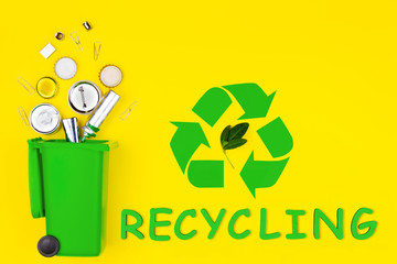 Aluminum metal reusable tin cans bottle caps in garbage recycling sign symbol Save nature pollution...