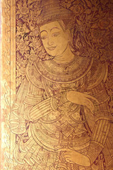 Fototapeta na wymiar decorated door in a buddhist temple (Wat Phra Sing) in chiang mai (thailand)