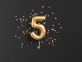 Fototapeta Five year birthday. Number 5 flying foil balloon and gold confetti on black. Five-year anniversary background. 3d rendering obraz