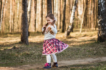  little girl in nature have fun and dance