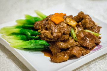 Stir fry australian beef with ginger and asparagus in savoury sauce