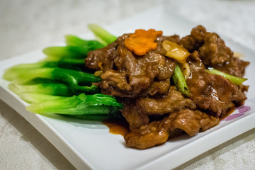 Stir fry australian beef with ginger and asparagus in savoury sauce