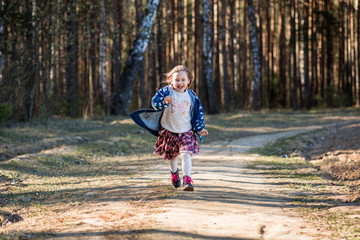  little girl in nature have fun and dance