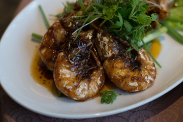 Seared King Prawns with Superior Soy Sauce and garnished with parsley on top