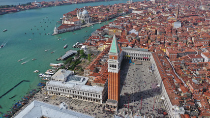 Fototapeta premium Aerial drone photo of iconic and unique Campanile in Saint Mark's square or Piazza San Marco, Venice, Italy
