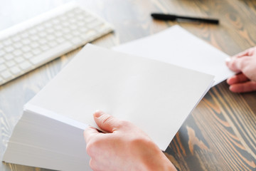 Obraz premium Human hands holds documents for examining