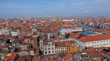 Obraz premium Aerial drone photo of iconic and unique Grand Canal crossing city of Venice as seen from high altitude, Italy