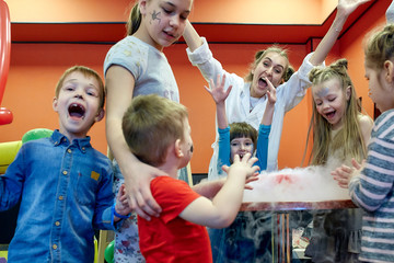 Chemical show for kids. Professor carried out chemical experiments with liquid nitrogen on Birthday...