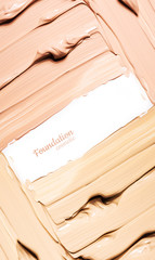 Smears of foundation for face.A smears of lipstick. Cosmetic smears of liquid. Samples of blush for the face.