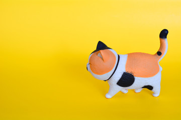 Cat toy isolated on a yellow background.