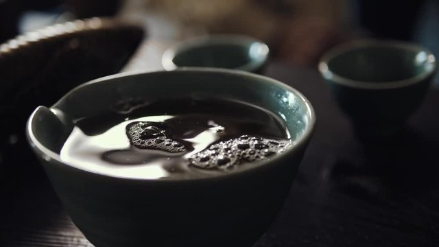 Tasty hot tea in a bowl