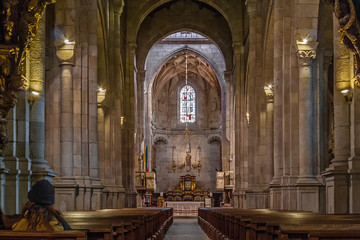 Braga, Portugal - December 28, 2017: Se de Braga Cathedral interior. Nave, main chapel and altar....