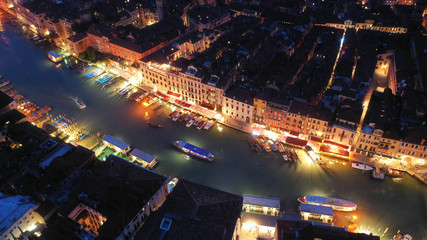 Fototapeta na wymiar Aerial drone top view photo of small Canal near Rialto bridge, Venice, Italy