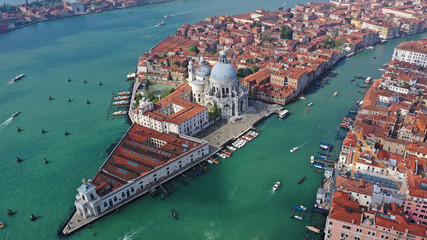 Aerial drone photo of iconic and unique Santa Maria Della Salute Cathedral in Grand Canal, Venice,...
