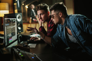 Sound engineer working in a music studio