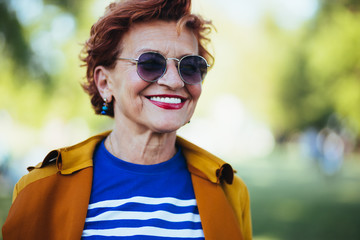 Portrait of a mature woman walking in the park