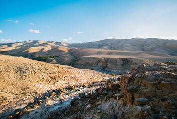 Desert and mountains in Jordan on sunrise.