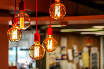 Fototapeta na wymiar Light bulbs on a blurred background