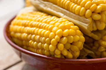 Healthy vegetarian food, freshly homemade cooked (boiled) sweetcorn on cob