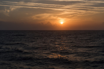 Sunset above sea