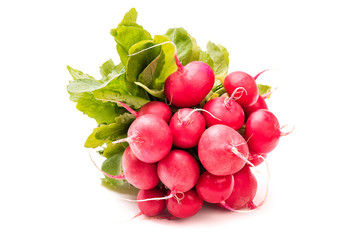bunch of radishes with green leaves