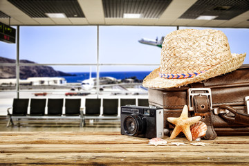 Suitcase on airport and summer travel time 