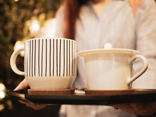business and job for woman in labor day from beautiful girl service and serve hot coffee or tea in her coffee shop