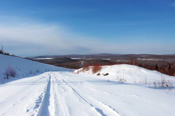 Fototapeta na wymiar winter landscape with road and snow