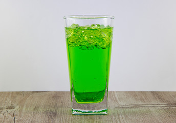 A glass of nutritious estragon drink to maintain a healthy lifestyle. Were added to the drink ice.