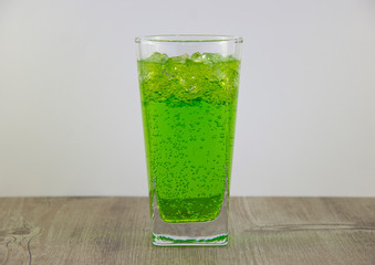 A glass of nutritious estragon drink to maintain a healthy lifestyle. Were added to the drink ice.