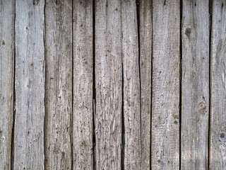 The texture of the old dilapidated wood, cracks, chips