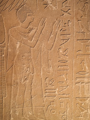 Ancient Egypt tomb hieroglyphs stone wall background