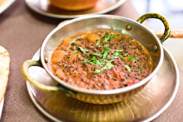 Typical indian cuisine meal made of lentils, parsley, garlic and spices