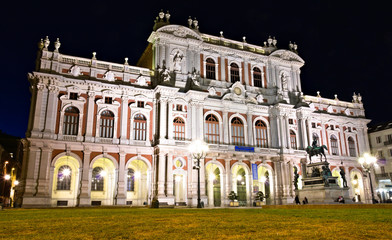 Turin, Italy - March 25, 2019: Palazzo Carignano, historical building from the XVII century in the centre of Turin, Italy, which houses the Museum of the Risorgimento. Night view, wide angle shot