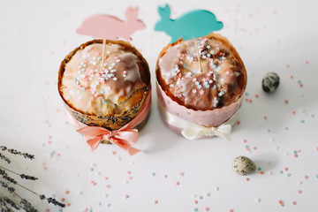 Spring still life. Homemade Easter cake. Easter holiday concept. Easter holiday background, spring season. Easter decoration with cakes and rabbits. top view. copy space  