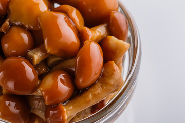 pickled vegetables on a white acrylic background