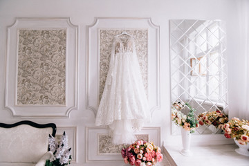 The bride's dress hangs