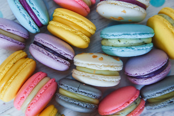 A lot of colorful macaroons on the candy shop.