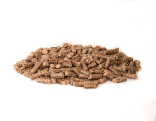 Fuel briquettes folded in rows on a white background. Wooden  briquettes are an environmentally friendly fuel source that are used to start a fire. They are made by pressing of dry sawdust.