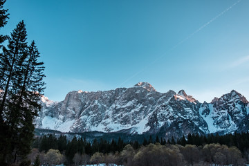 Sun goes down on Mangart, Italian alps