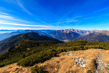 Fototapeta na wymiar Sunny autumn day at the mount Tersadia in the italian alps