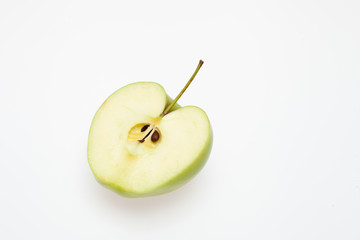 Cut green Apple on white background isolated