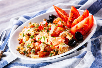 Breakfast - scrambled eggs with vegetables