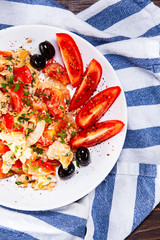 Breakfast - scrambled eggs with vegetables