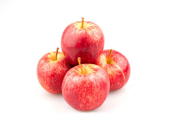 Ripe red apples on white background
