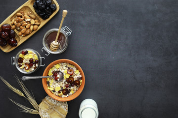Healthy breakfast. Muesli from cereals with milk berries.