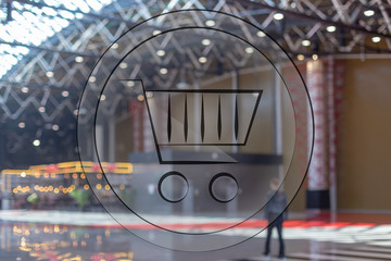 Fototapeta na wymiar 3d shopping basket on shopping center blur background.