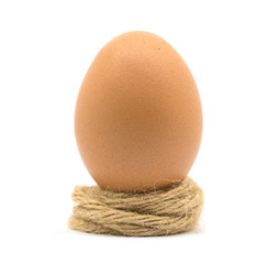 Egg chicken on brown rope white background